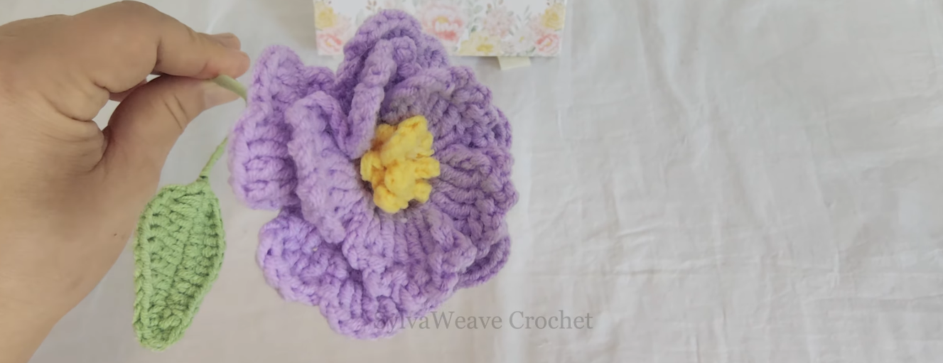 Assembled crochet Butterfly Ranunculus flower with leaf