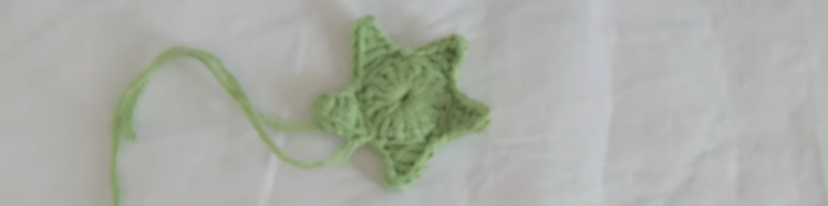Green crochet flower base for the Butterfly Ranunculus