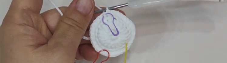 White calla lily flower after rounds 1 to 3 with stitch markers