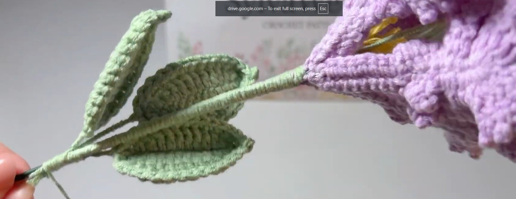 Attaching green crochet leaves to the Crape Myrtle flower stem