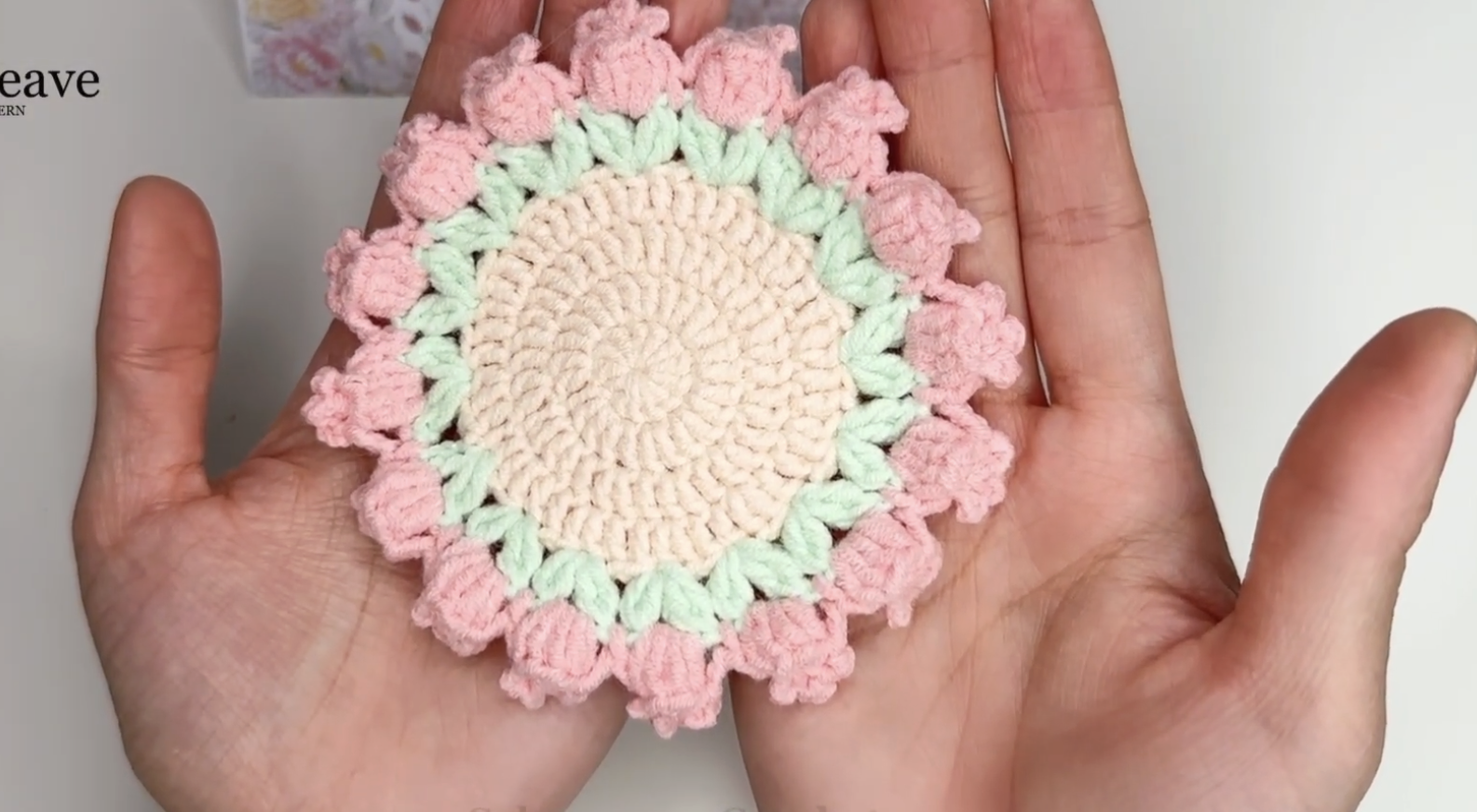 Finished pink and green crochet tulip flower coaster