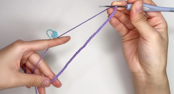Starting the crochet lavender flower with a chain of 45 stitches