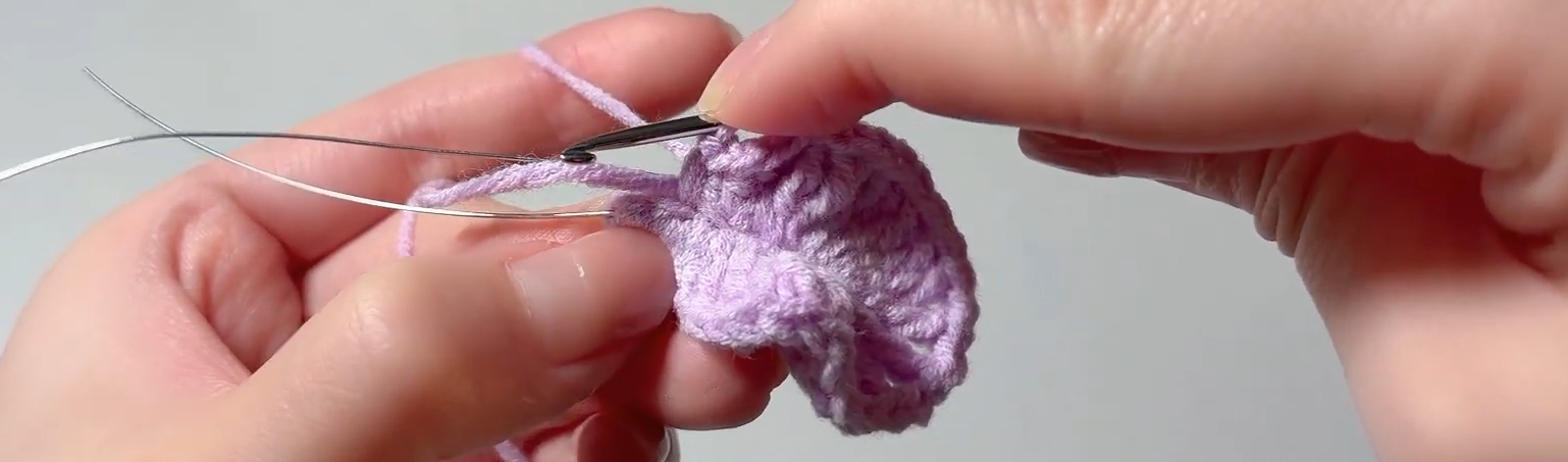 Crocheting around the tip of a Crape Myrtle flower petal