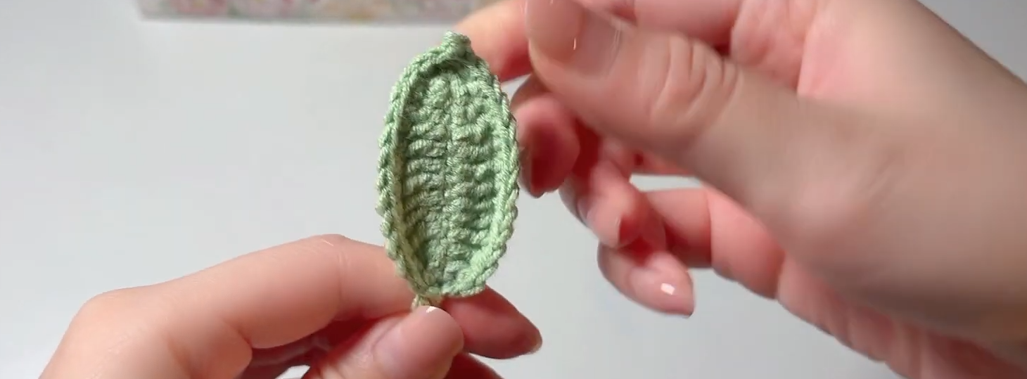Finished wired green crochet leaf for a Crape Myrtle flower